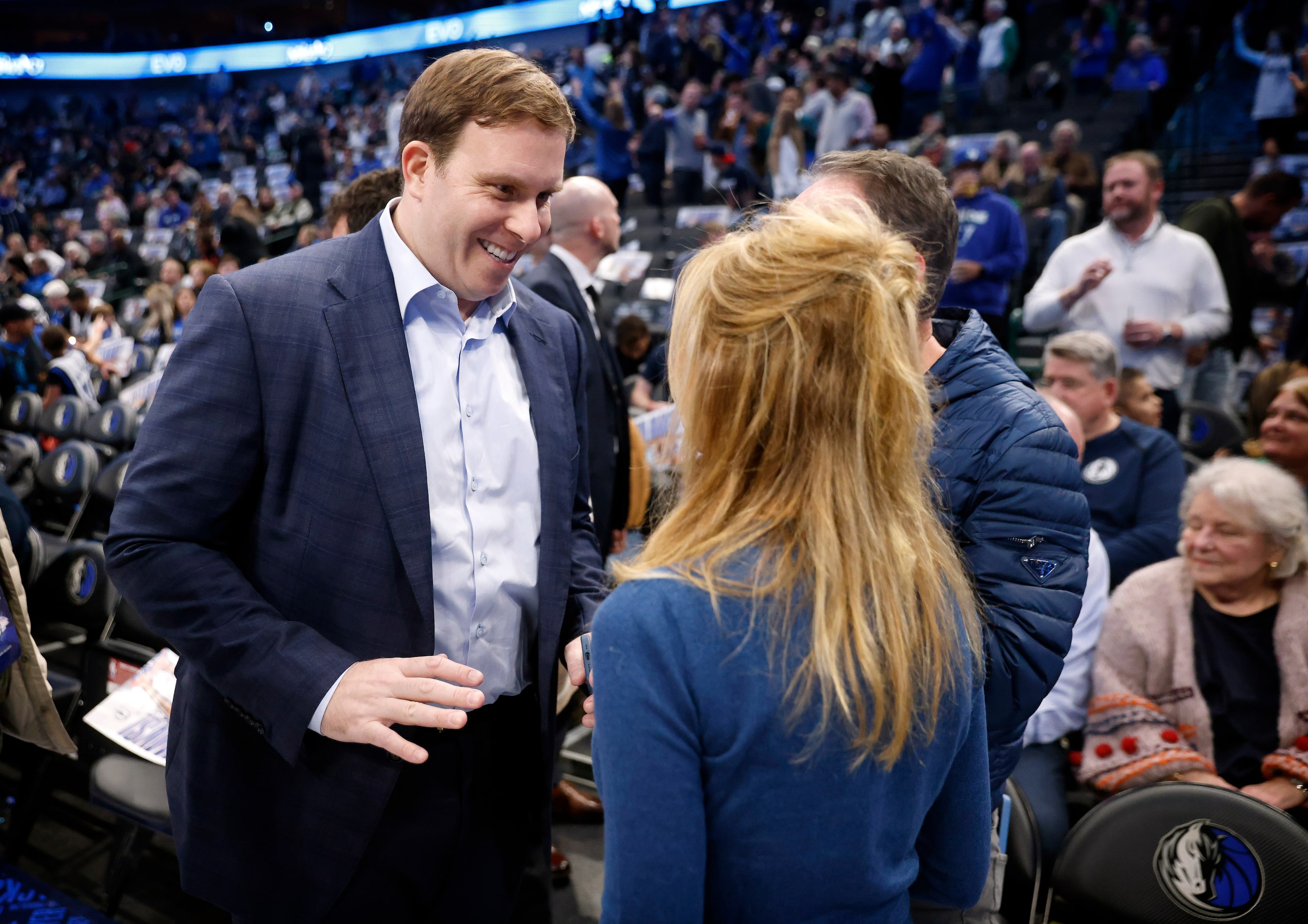 Dallas Mavericks new governor and majority owner Patrick Dumont (left) visits with fans...