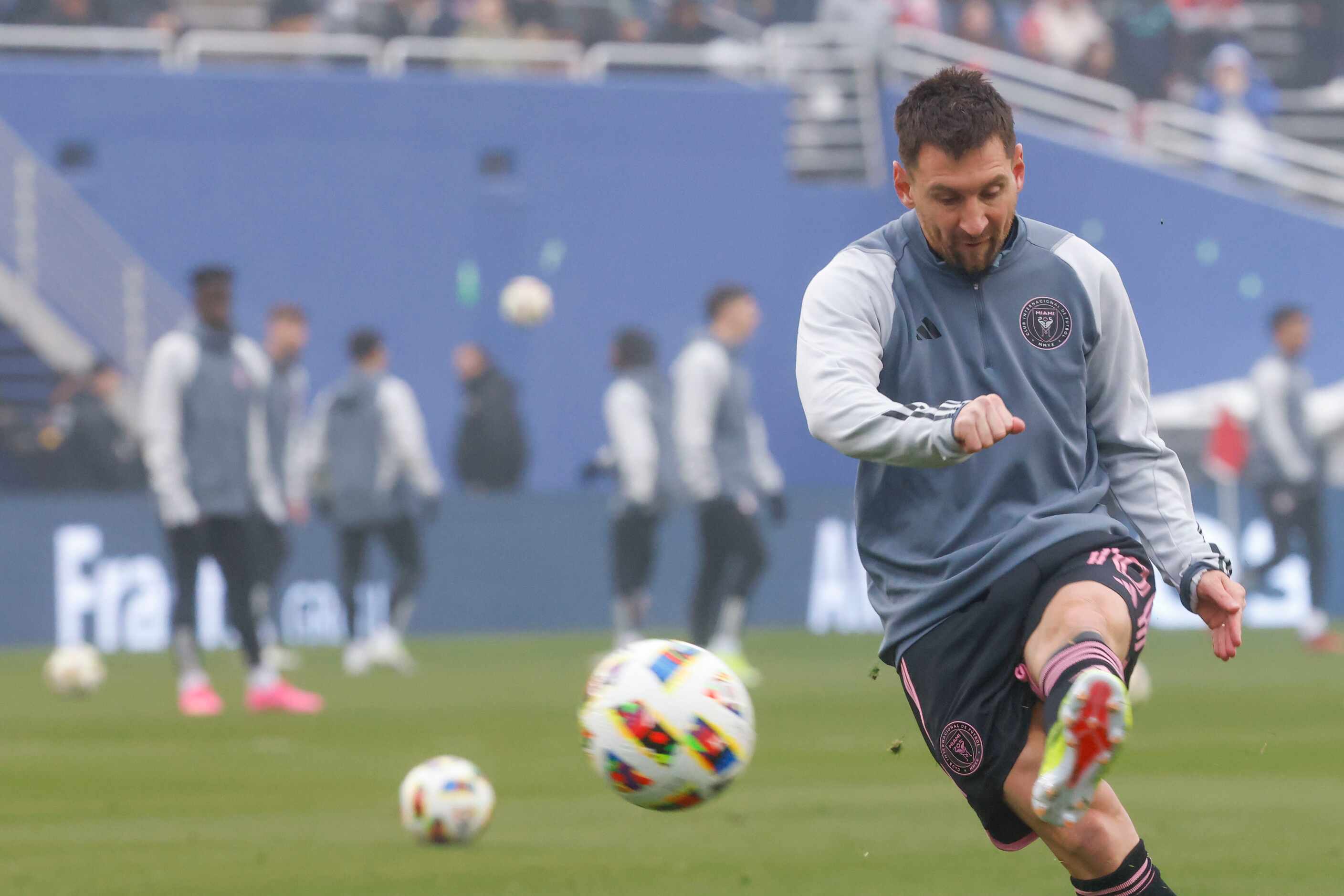 Inter Miami forward Lionel Messi warms up ahead of a preseason friendly soccer game against...