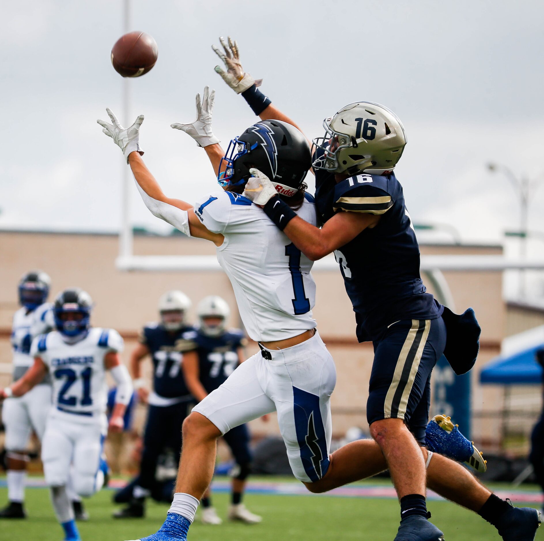 Dallas Christian's Garrett Tillett (1) intercepts the pass intended for Austin Regents'...