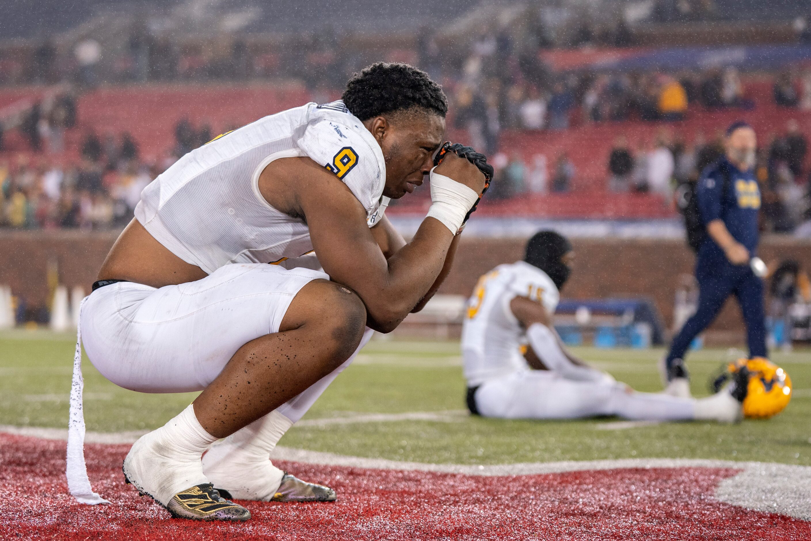 McKinney senior linebacker Jonathan Agumadu (9) cries in dejection after losing to Highland...