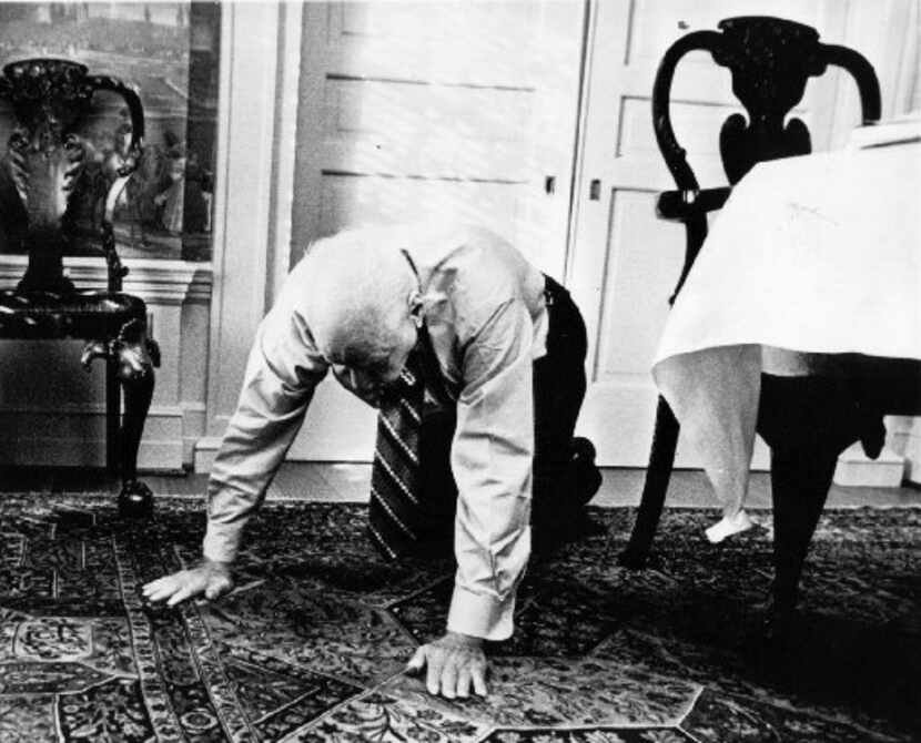 Dallas billionaire H. L. Hunt, 83, demonstrates his yoga exercise called "creeping," which...