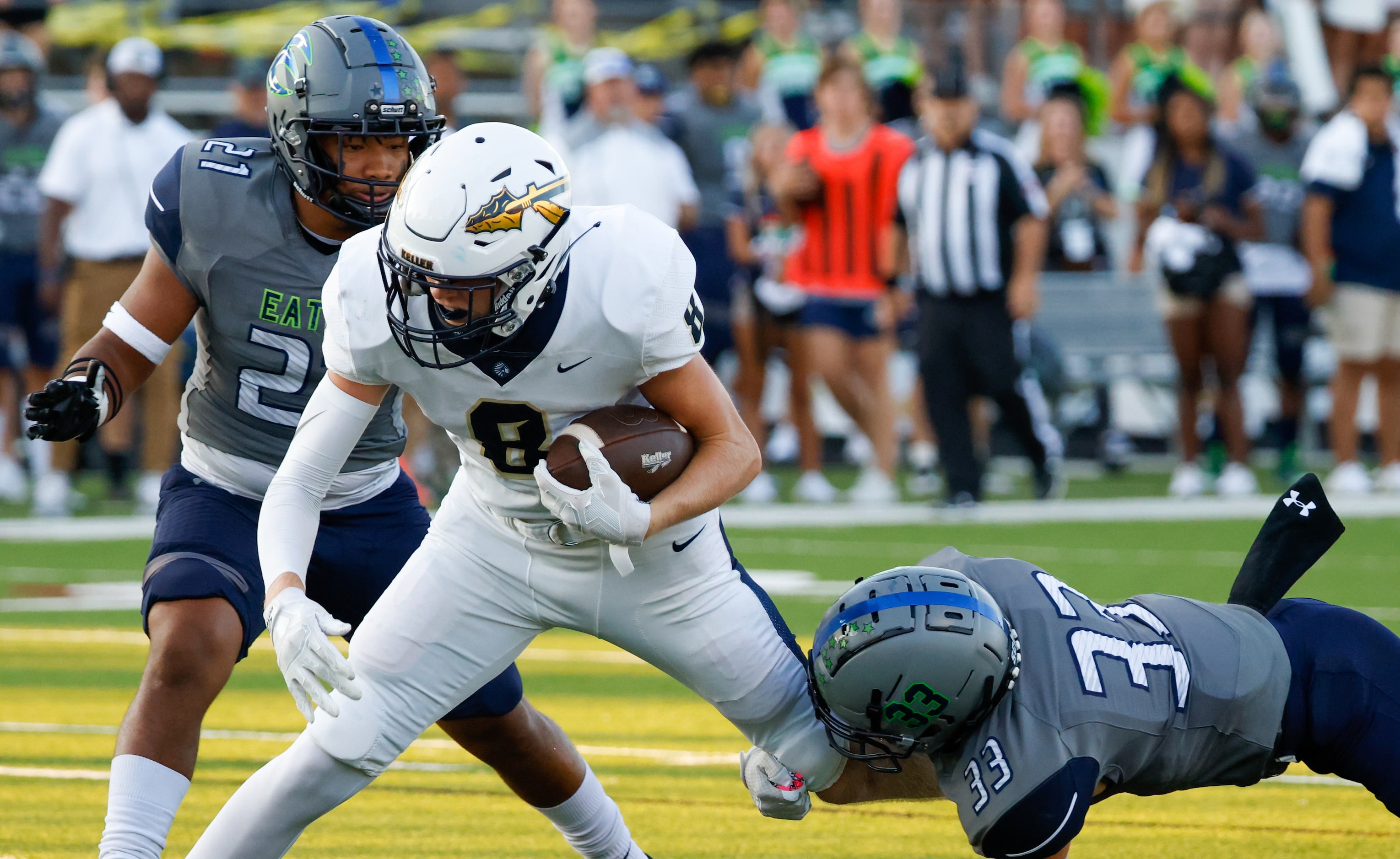 Keller High School wide receiver Parker Ireson (8) leans into the end zone for the first...