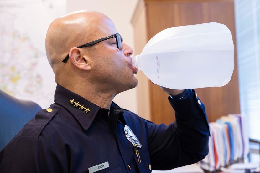Dallas police Chief Eddie García drank his gallon of water in his office at Jack Evans...