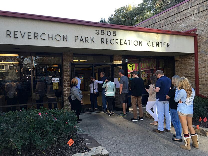  The line of voters Tuesday afternoon stretched outside the door at Reverchon Park...