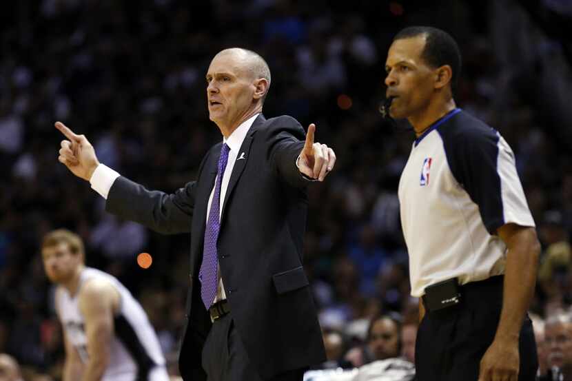 Dallas Mavericks head coach Rick Carlisle calls out instruction to his players during the...