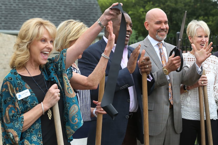 Emily's Place CEO Lori Conley (left) is all smiles during the groundbreaking ceremony for a...