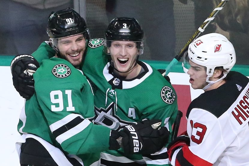 Dallas Stars Tyler Seguin (91) and John Klingberg (3) celebrate Seguin's goal in the second...