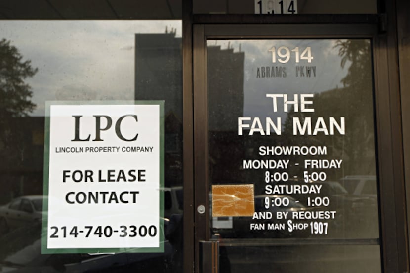 A "for lease" sign marks the storefront of a shuttered Lakewood business where the Fan Man...