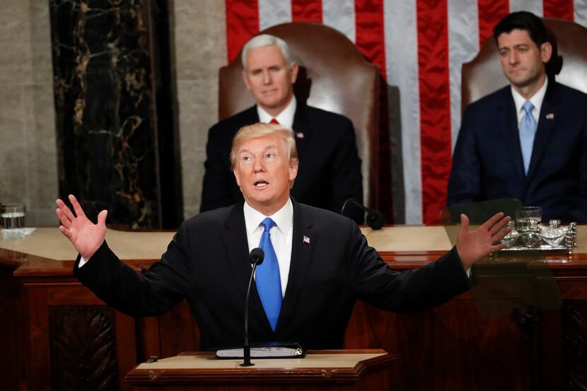In this Jan. 30, 2018 photo, President Donald Trump delivers his State of the Union address...