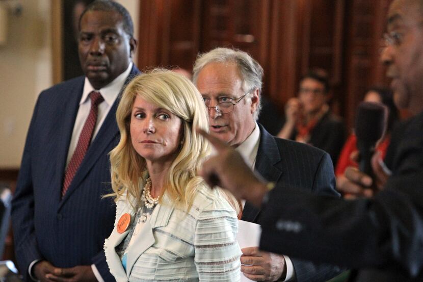 State Senator Wendy Davis awaits the ruling for the point of order about Senator Rodney...