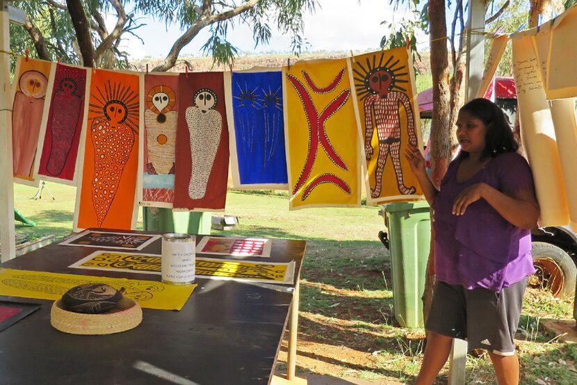  Edna Dale displaying her art at the art center in Imintji