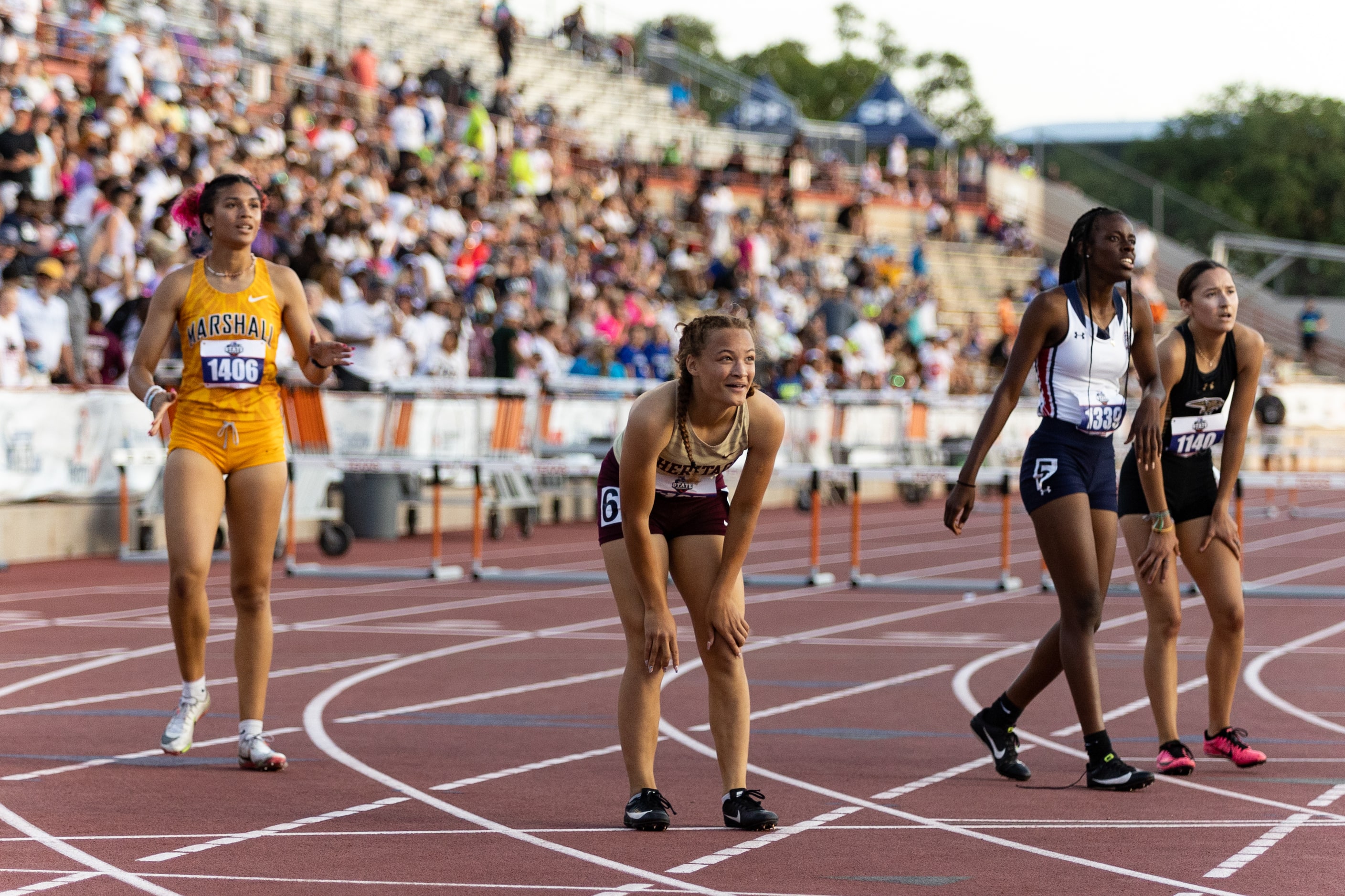 Kirin Chacchia of Frisco Heritage reacts after winning the girls’ 300m hurdles at the UIL...