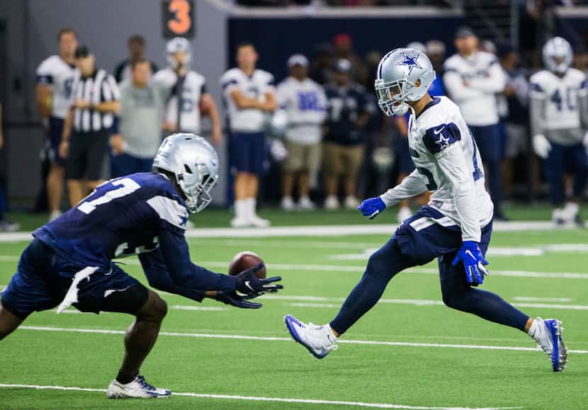 Dallas Cowboys wide receiver Devin Smith (15) misses a pass that falls in to the hands of...
