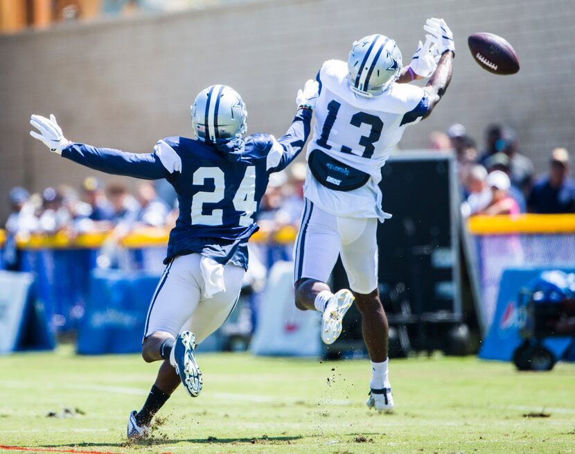 Dallas Cowboys wide receiver Michael Gallup (13) misses a catch while cornerback Chidobe...