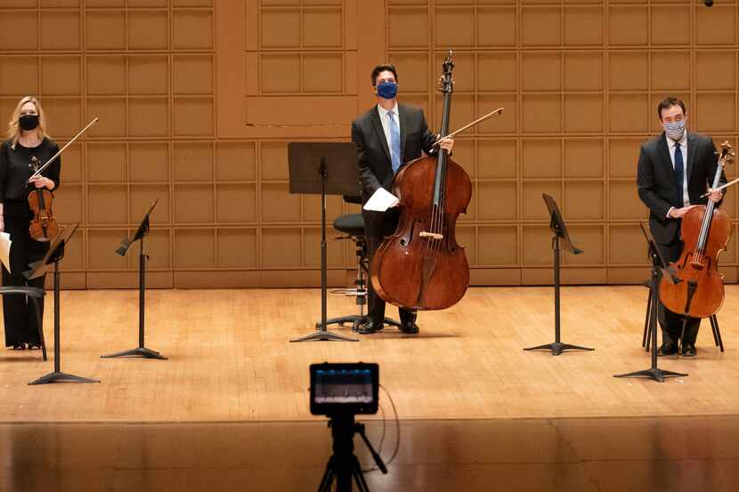 Members of the Dallas Symphony Orchestra were introduced for a video recording before...