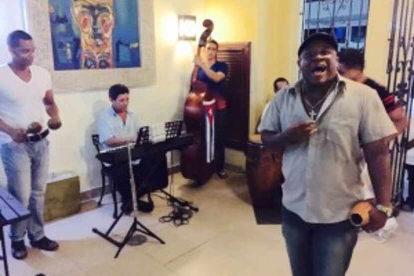  Reinerio Proenza Geral, 30, sings at a bar in Old Havana.