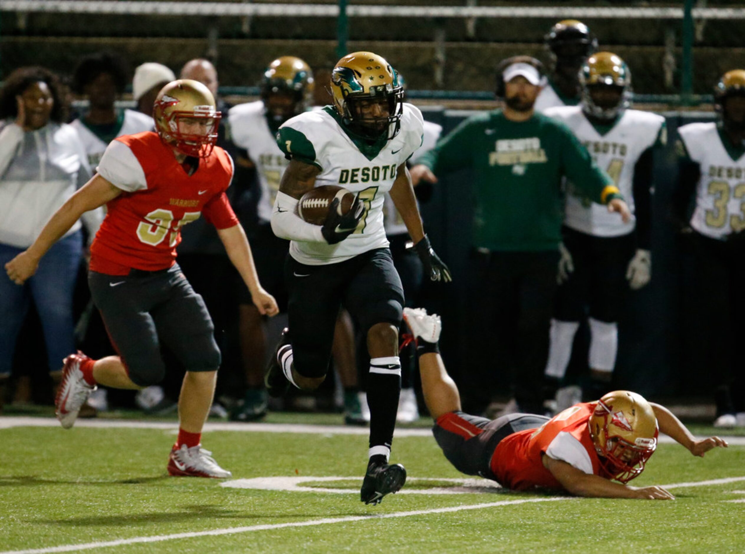 Desoto's Vontae Shenault (1) returns a punt for a 78 yeard touchdown during the second half...