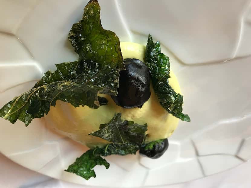 Poblano mousse with huitlacoche glaze and fried hoja santa, served by Diego Fernandez during...