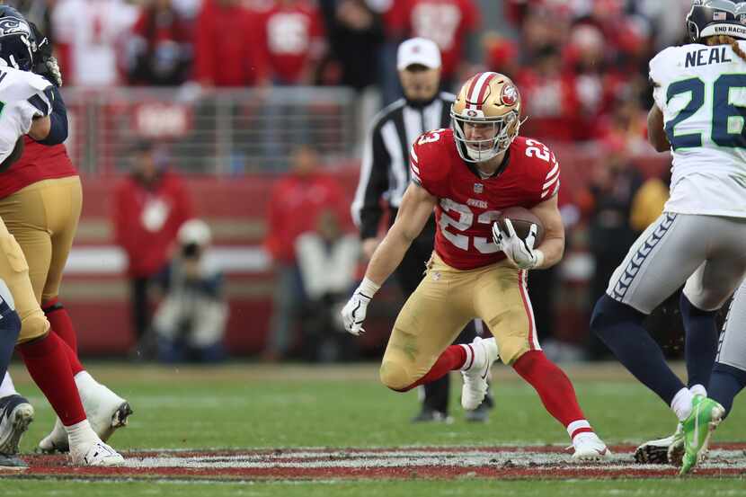 San Francisco 49ers running back Christian McCaffrey (23) runs during an NFL wild card...