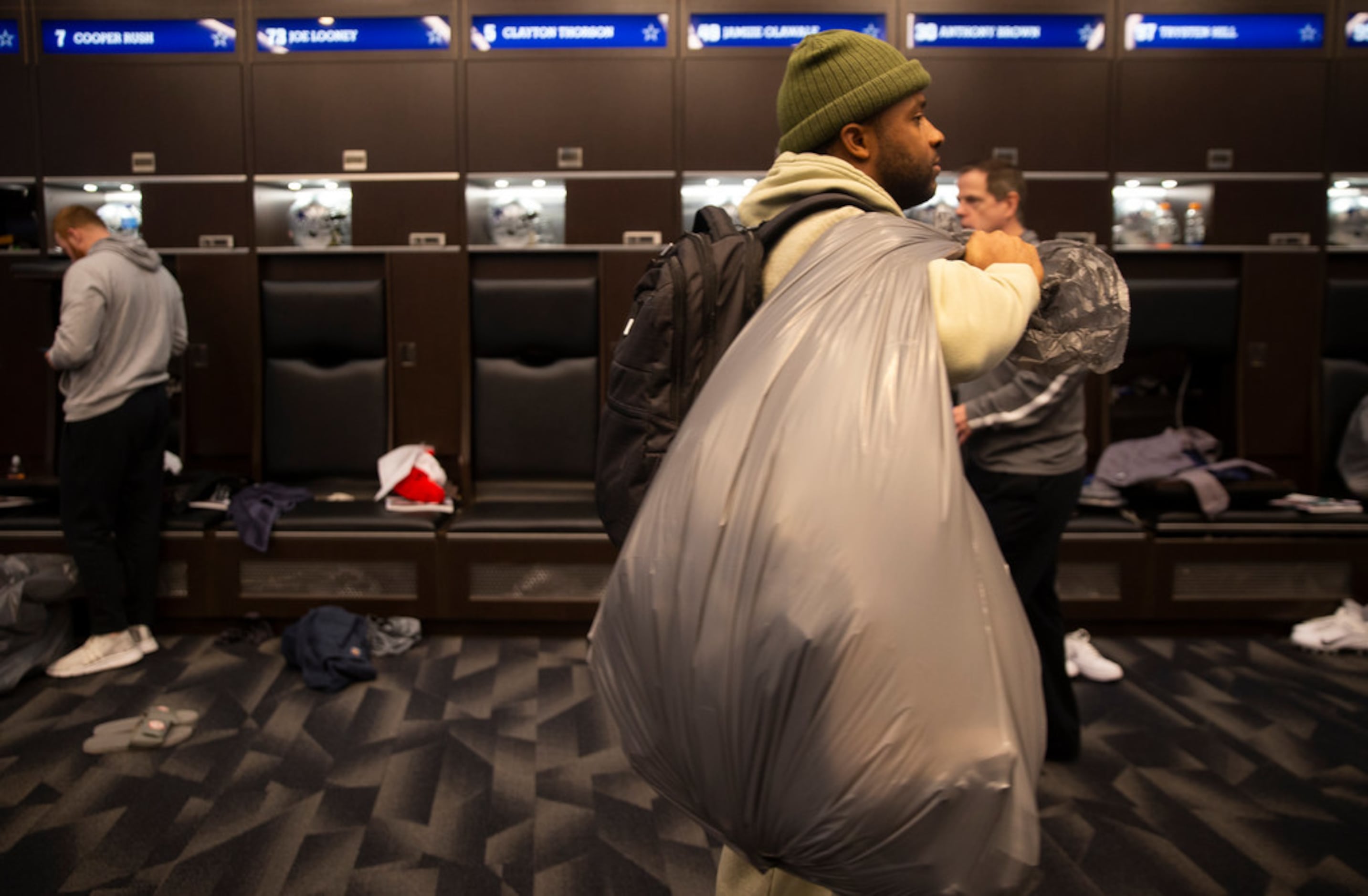 Dallas Cowboys WR Randall Cobb (#18) walks out after cleaning out his locker at The Star on...