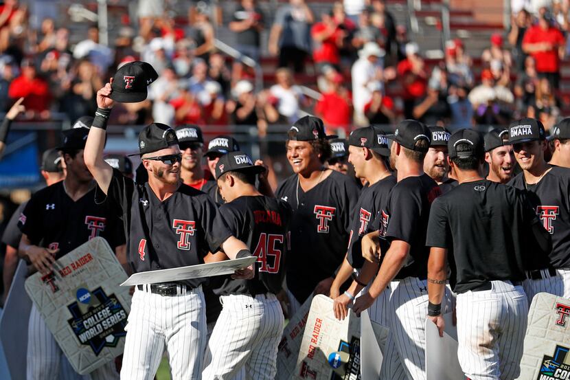 Texas Tech's Grant Little (4) celebrates with his teammates after an NCAA college baseball...