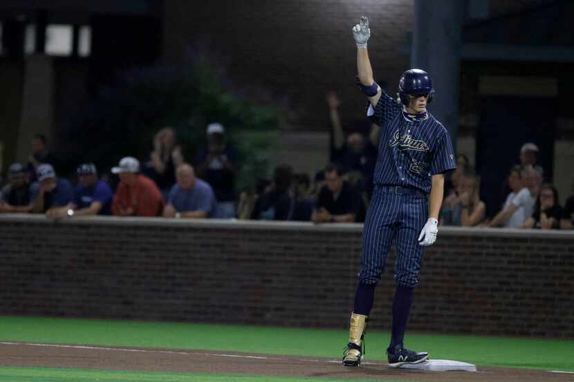 Keller’s Ty Zahradnik (27), reacts after hitting a single against Flower Mound Marcus that...