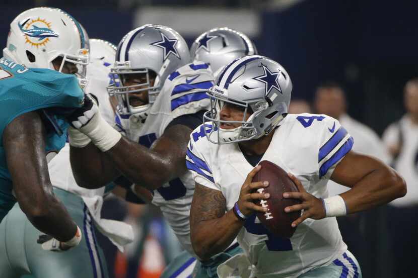 Dallas Cowboys quarterback Dak Prescott (4) against the Miami Dolphins at AT&T Stadium in...
