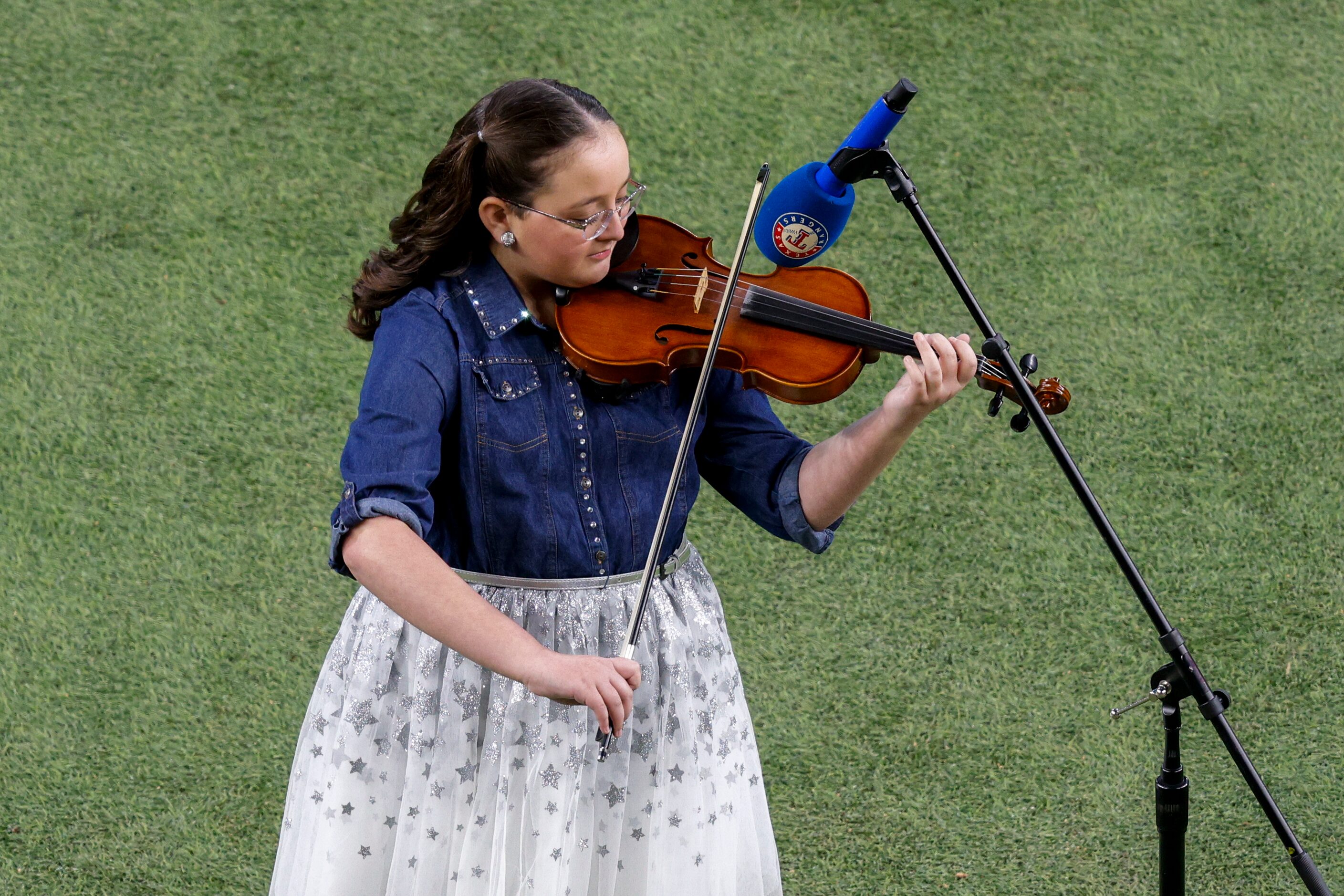 11-year-old violinist Sabrina Patel performs the national anthem before Game 5 of the...