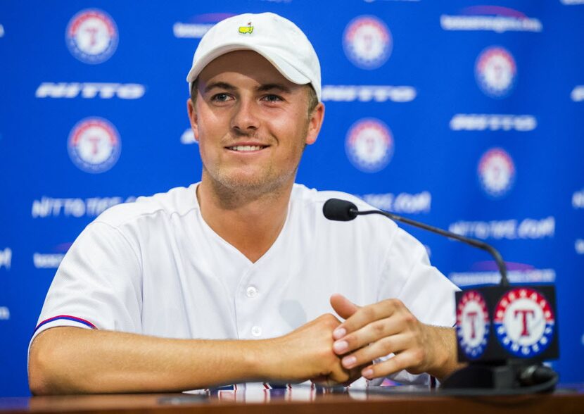 Pro golfer Jordan Spieth answers media questions during a press conference after he threw...