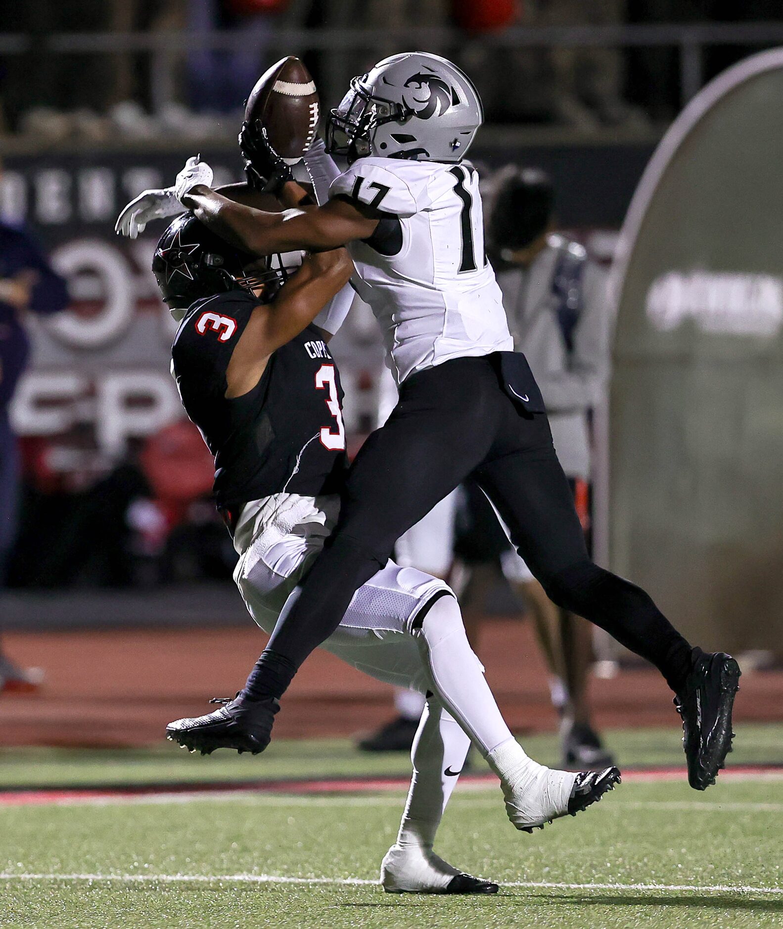 Denton Guyer defensive back DJ Reese (17) takes the ball away from Coppell wide receiver...