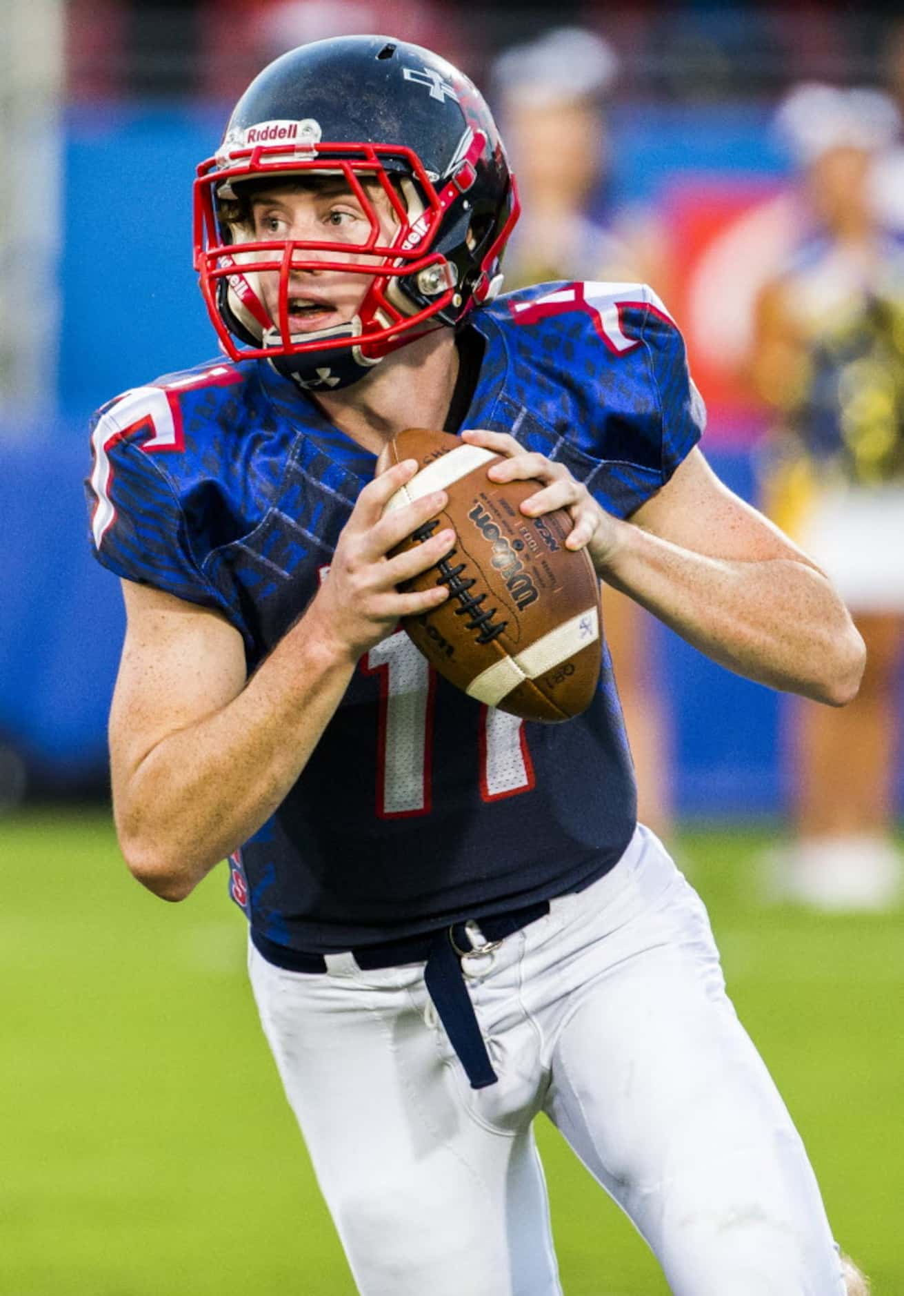 Frisco Centennial quarterback Kyle Rdington (11) prepares to throw a pass during the first...