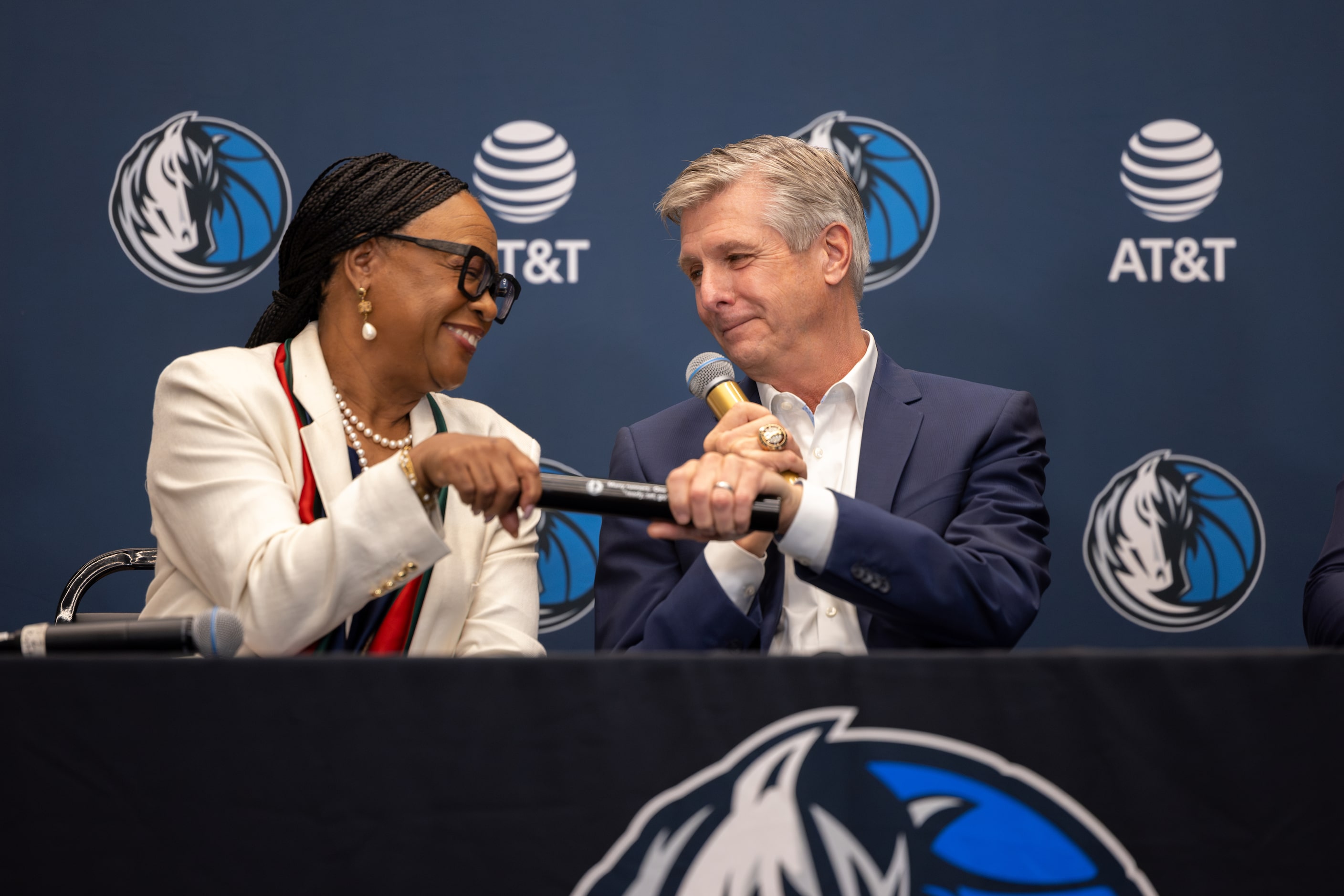 Dallas Mavericks Chief Executive Officer Cynt Marshall symbolically passes the baton to NBA...