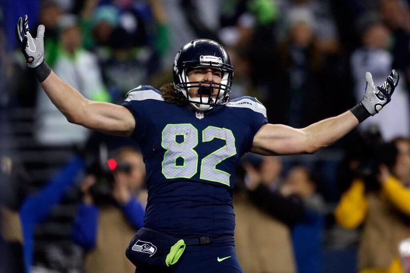 SEATTLE, WA - JANUARY 10:  Luke Willson #82 of the Seattle Seahawks celebrates after scoring...