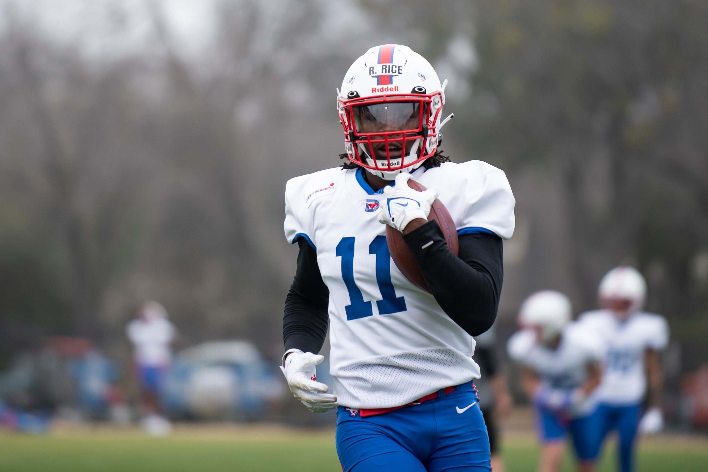 SMU senior Rashee Rice (11) catches a pass during football practice at Gerald J. Ford...