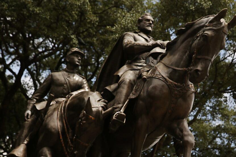 A statue of Confederate Gen. Robert E. Lee stands in the Dallas park named in his honor.