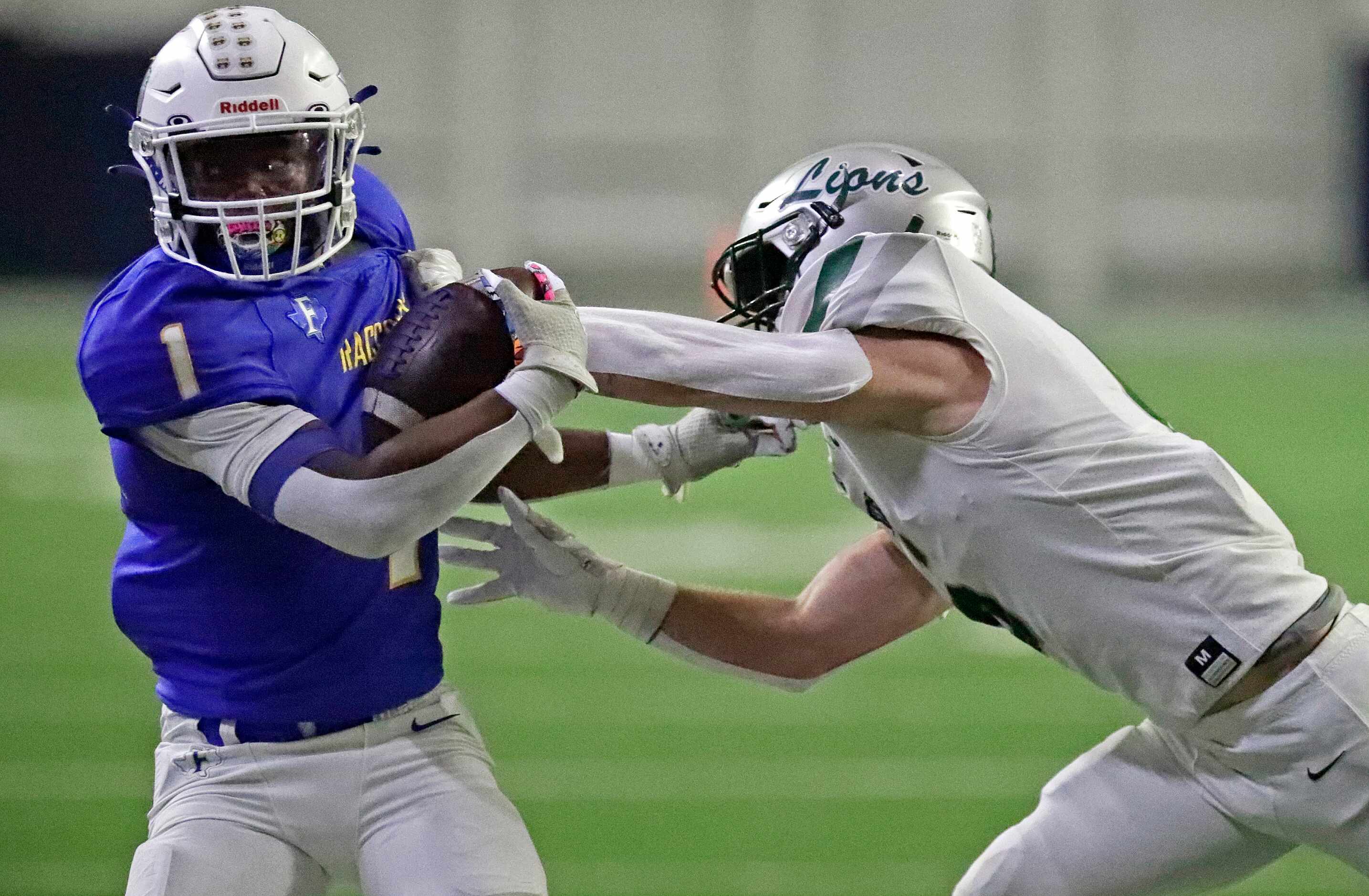 Frisco High School running back Kam Pendergraph (1) is run out of bounds by Reedy High...