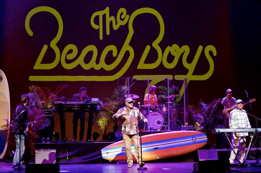 Mike Love, center, and Bruce Johnston, right, of The Beach Boys perform at Verizon Theatre...