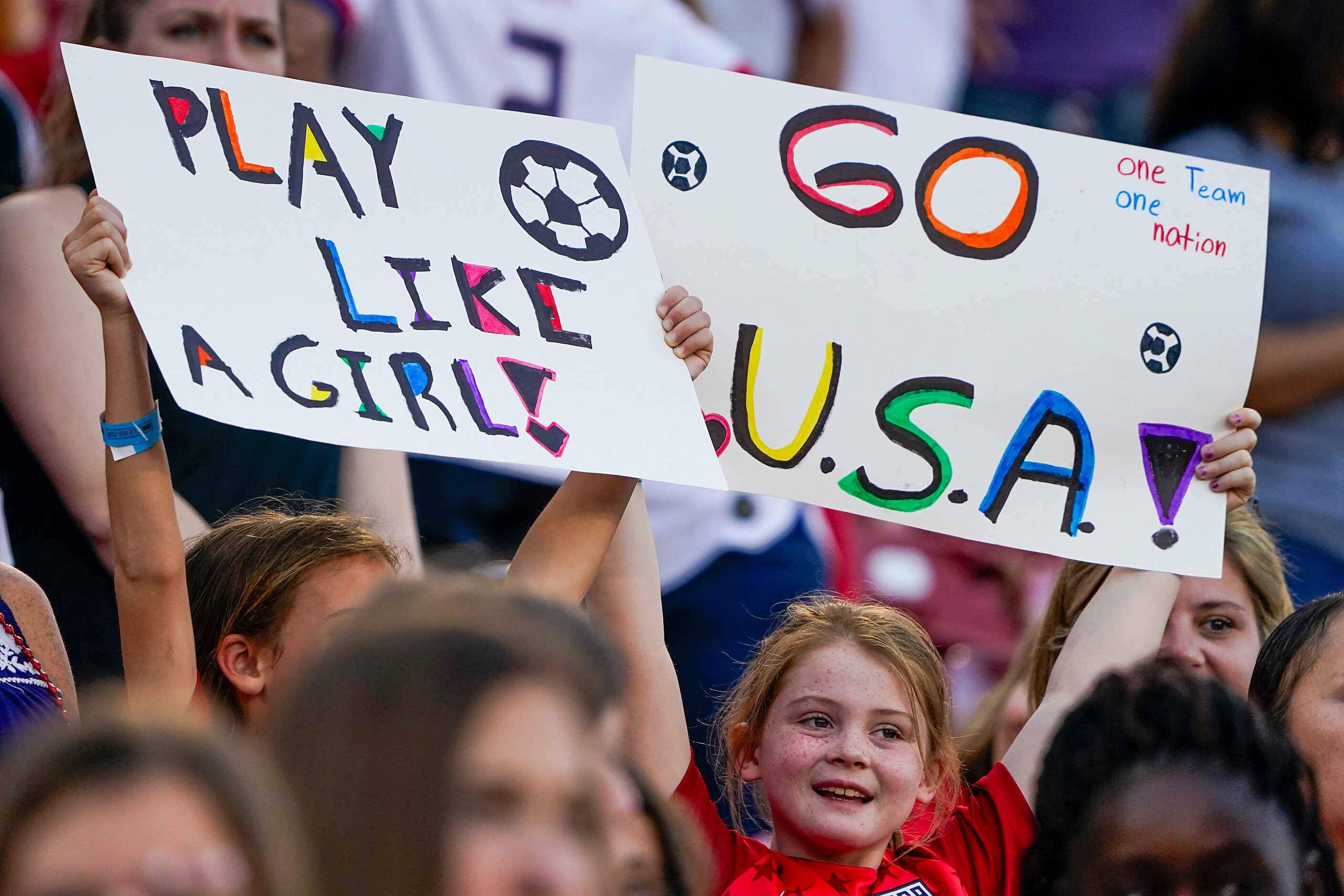 Young fans cheer the USA before a SheBelieves Cup soccer game against Japan on Wednesday,...