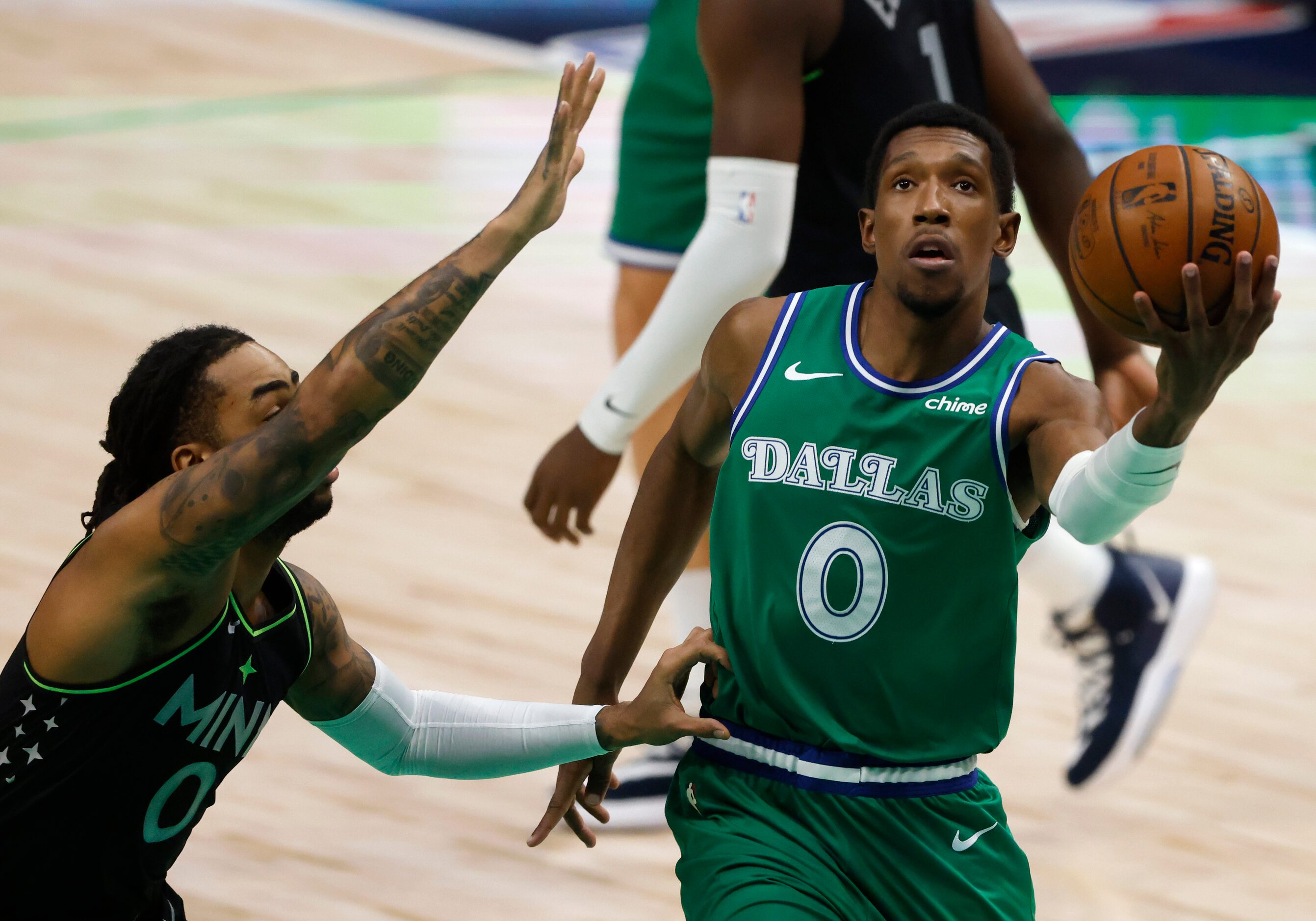 Dallas Mavericks guard Josh Richardson (0) attempts a layup in front of Minnesota...