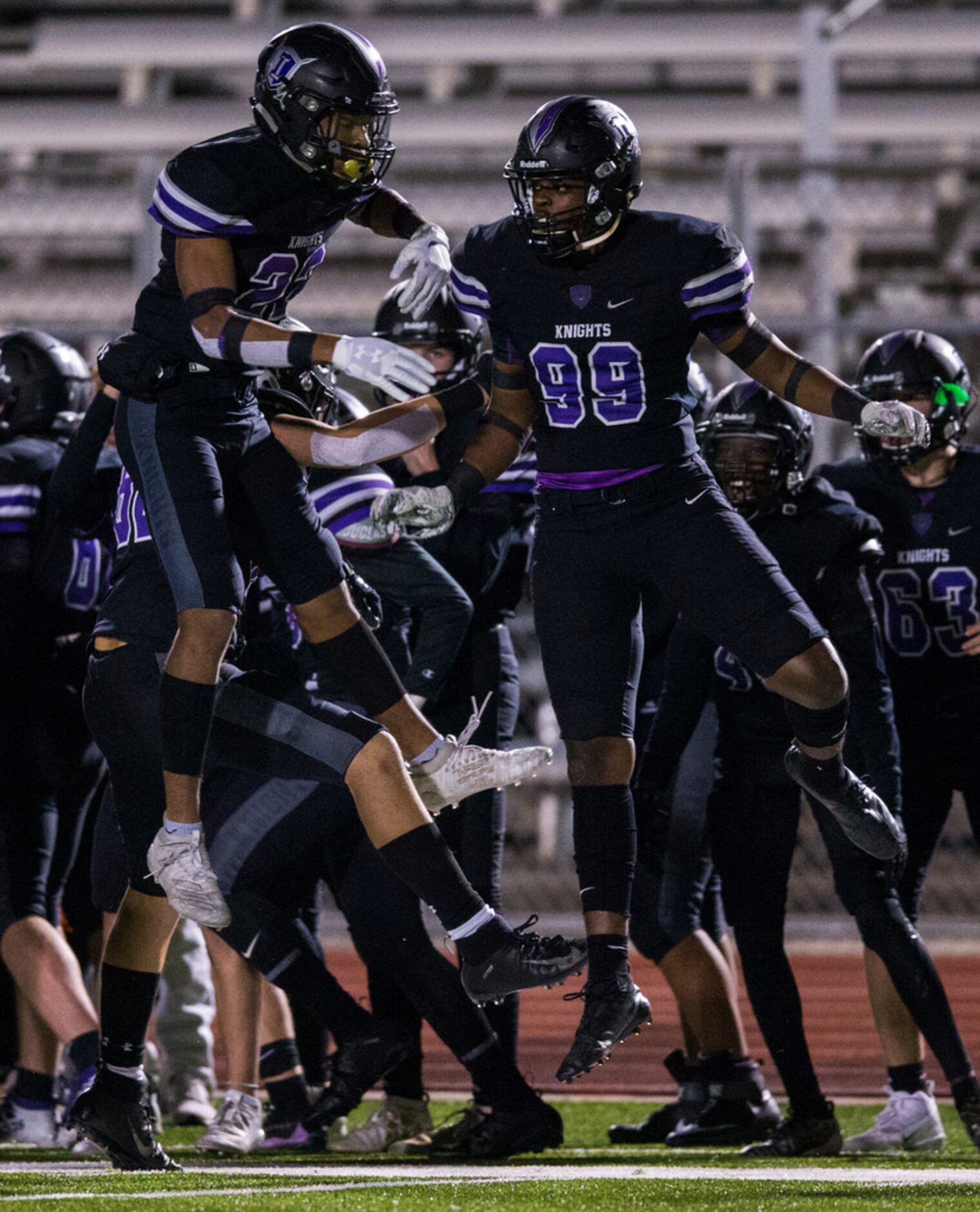 Frisco Independence defensive back Brayden West (22) and defensive end Jordan Parrish (99)...