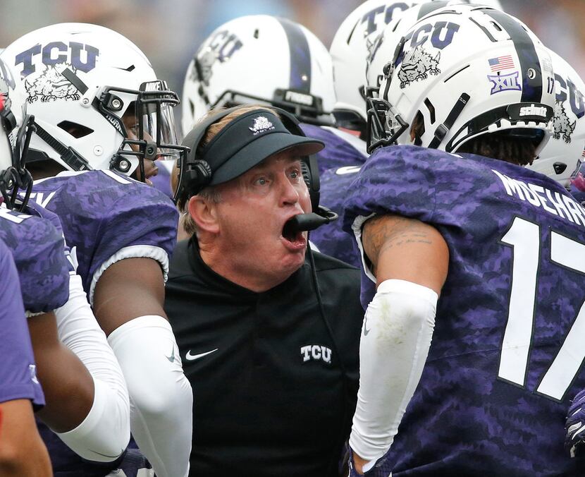 FILE - TCU head coach Gary Patterson fires up his troops on the sidelines in the second...