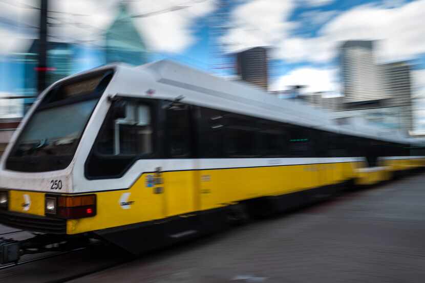 A DART train arrives to the West End Station in downtown Dallas, on Friday, March 18, 2022.
