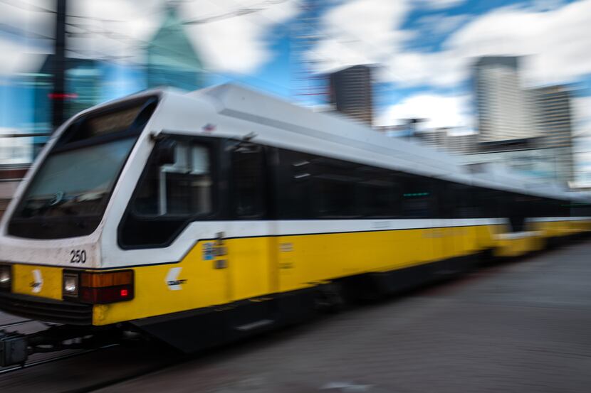 A DART train arrives at the West End Station in downtown Dallas on Friday, March 18, 2022.