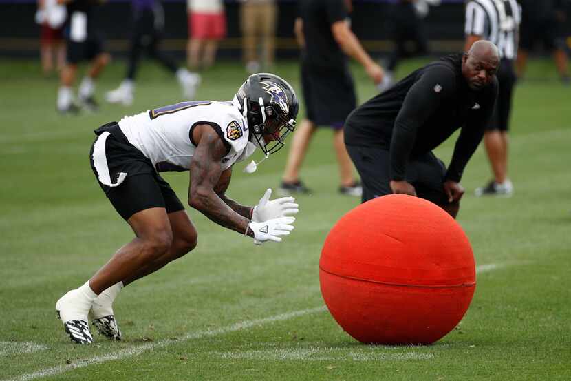 Baltimore Ravens defensive back DeShon Elliott runs a drill during an NFL football training...