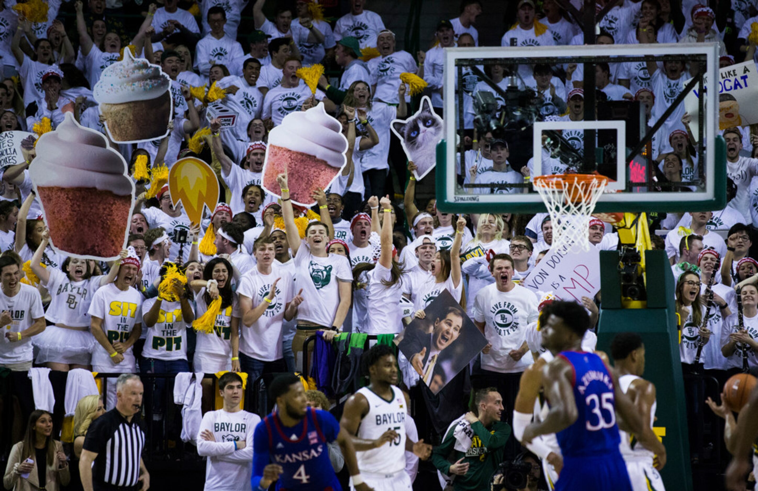 Baylor Bears fans cheer during the second half of an NCAA men's basketball game between...