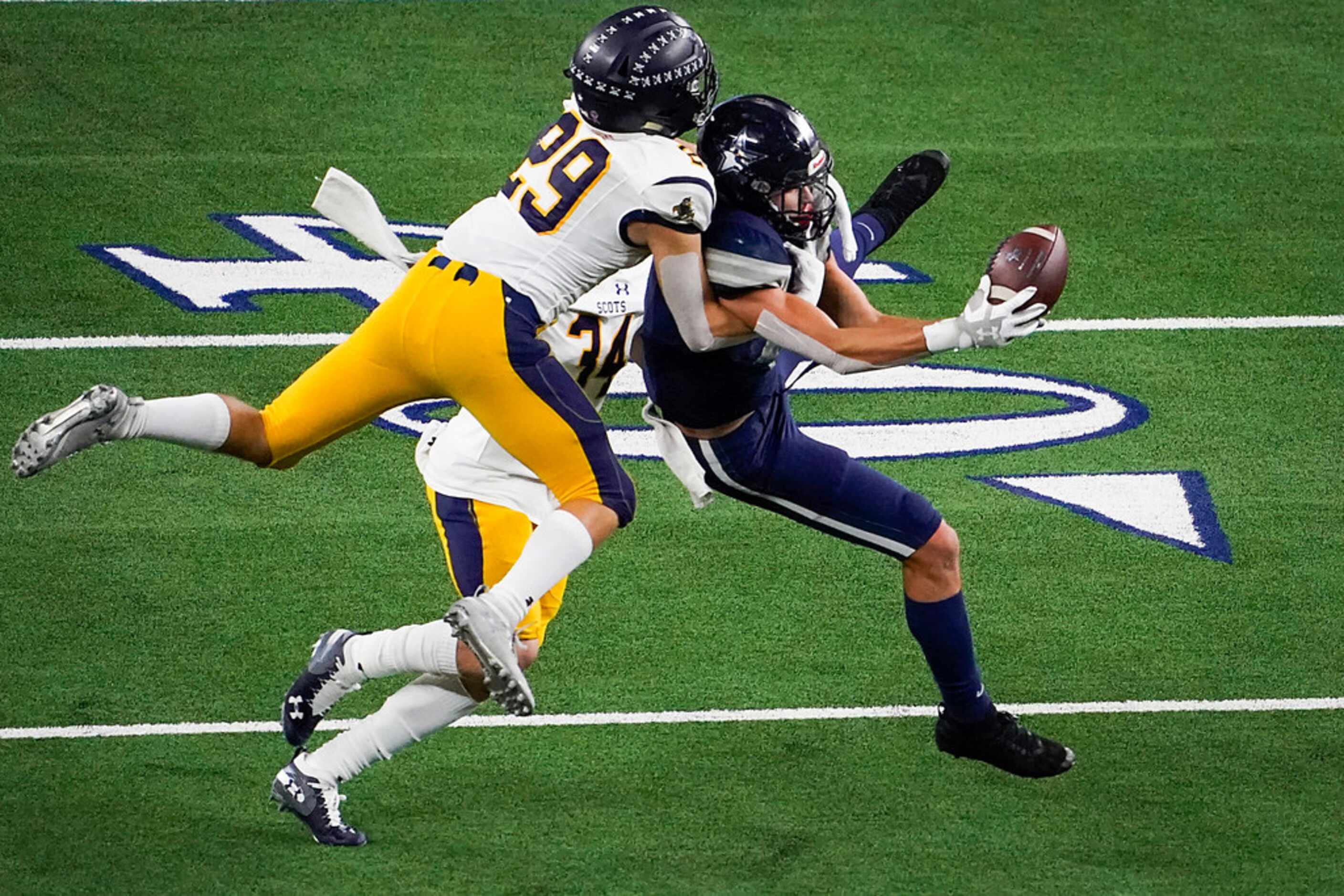 Frisco Lone Star wide receiver Trace Bruckler (4) hauls in a 33-yard pass as Highland Park...