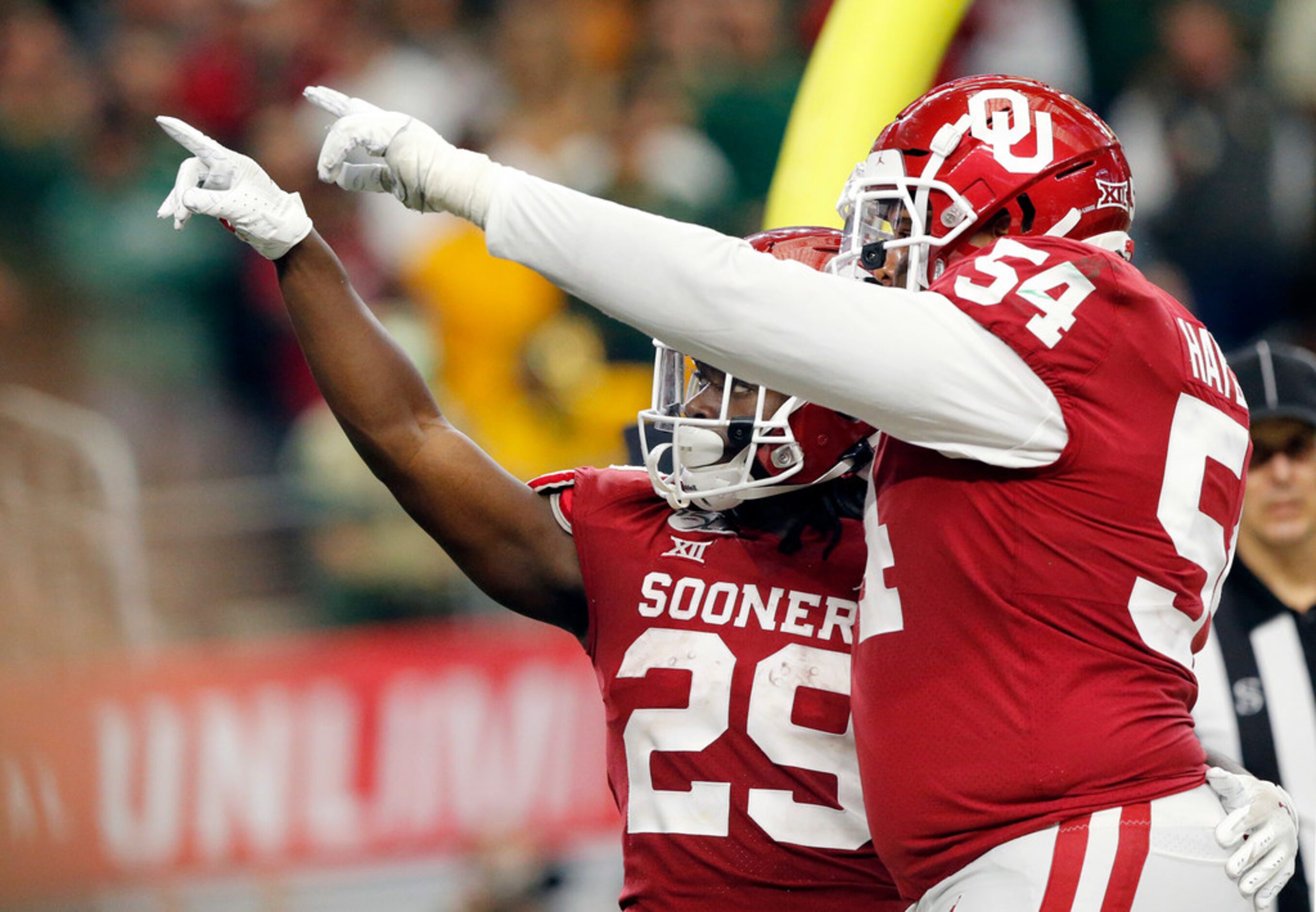 Oklahoma Sooners offensive lineman Marquis Hayes (54) celebrates Oklahoma Sooners running...