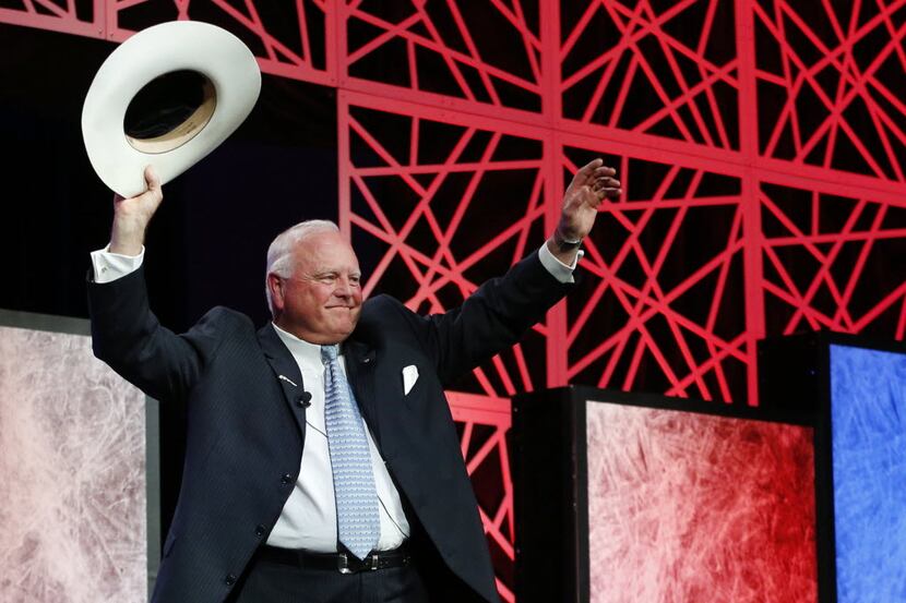 Texas Agriculture Commissioner Sid Miller acknowledged the crowd as he was introduced to...