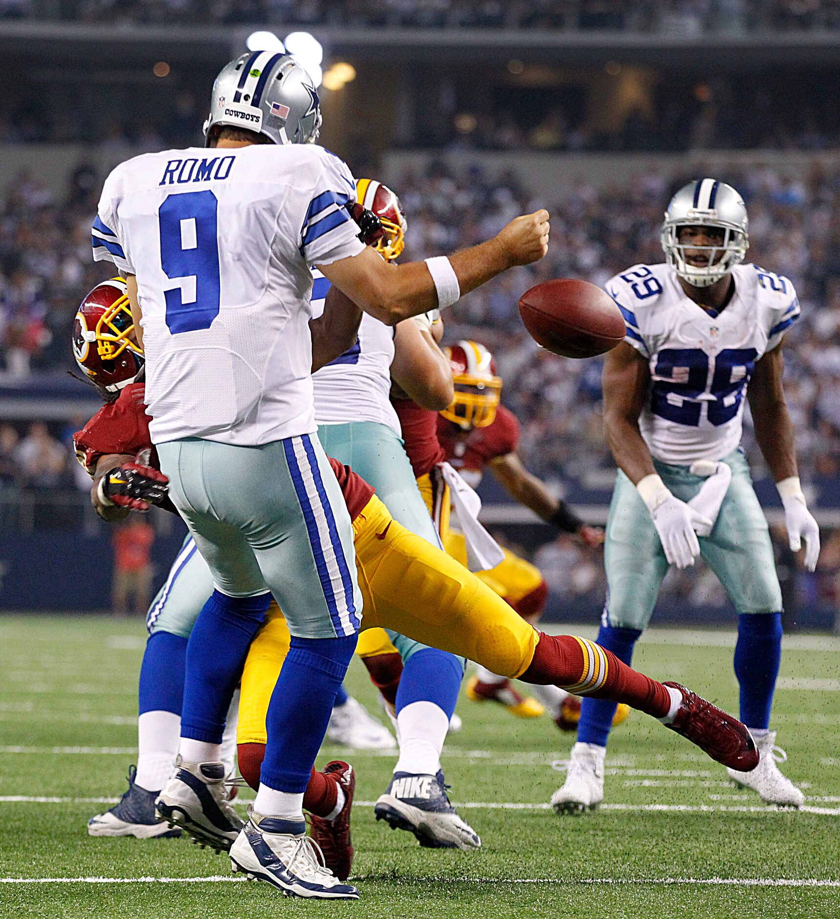 Washington Redskins strong safety Brandon Meriweather (31) sacks Dallas Cowboys quarterback...