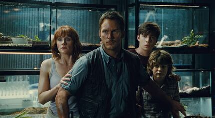 Bryce Dallas Howard and Chris Pratt in a scene from "Jurassic World." 